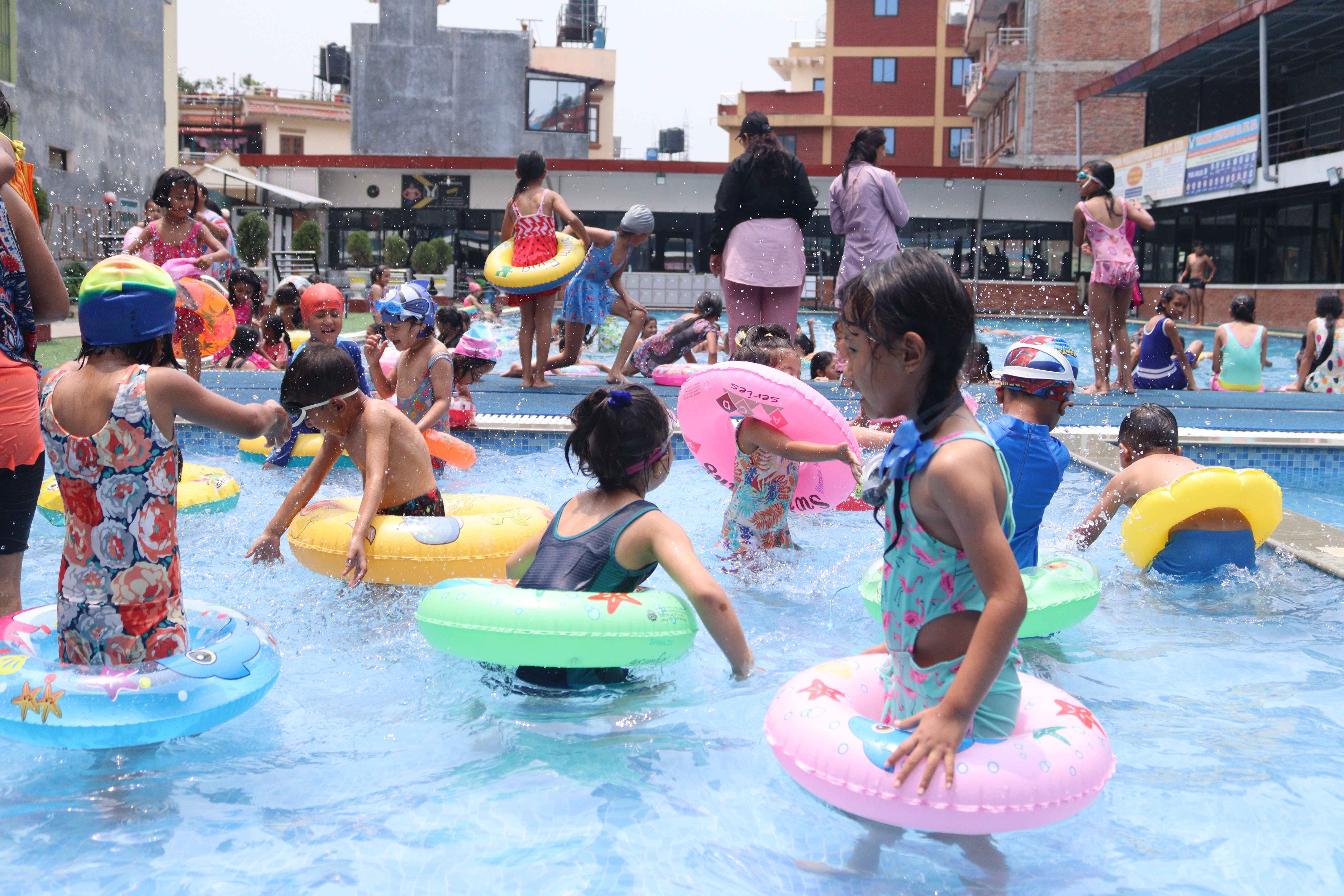 children are swimming