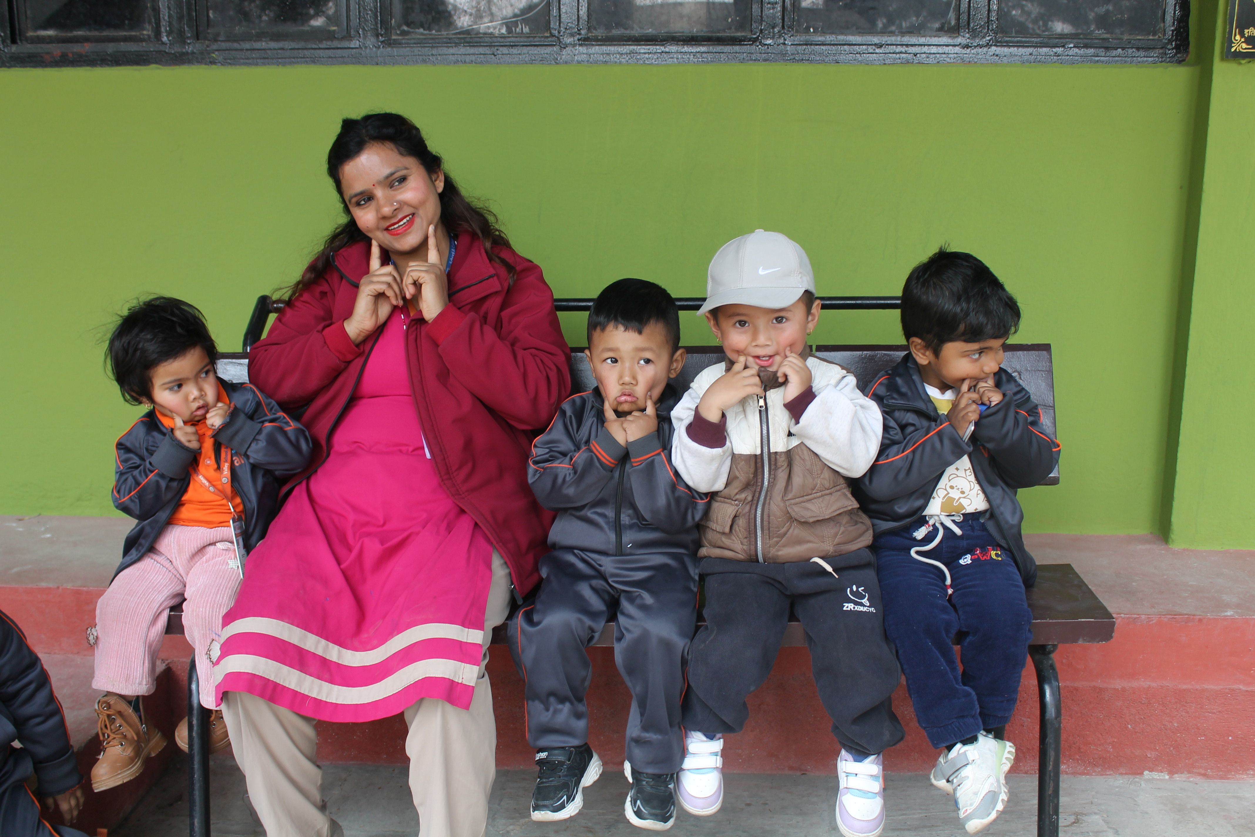 Children are happy with teacher