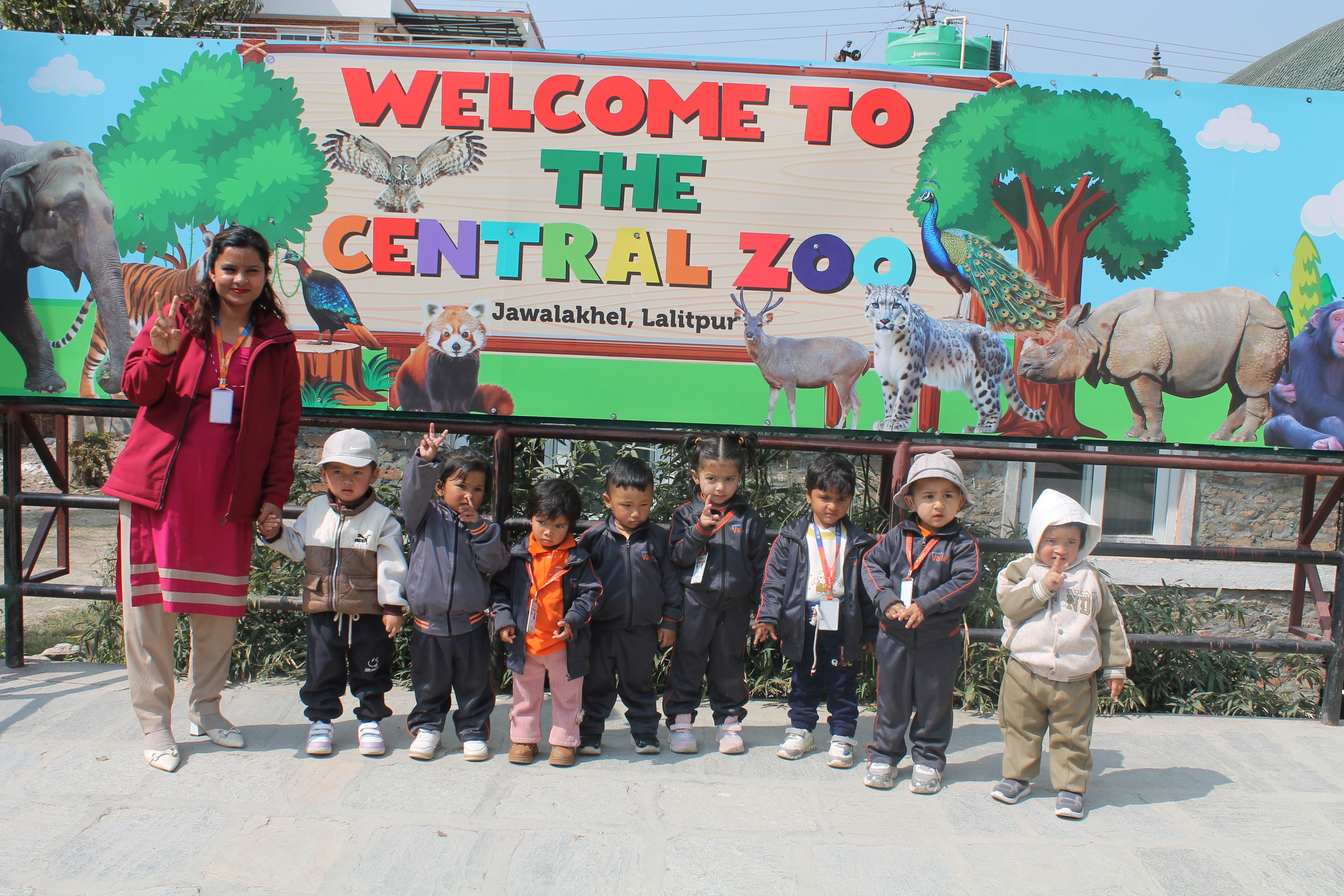 Children group photo with teacher in Field Trip To Central Zoo