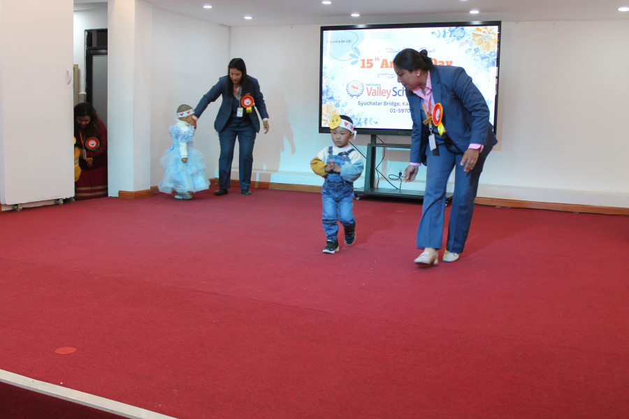 Young preschool students on stage during cultural program