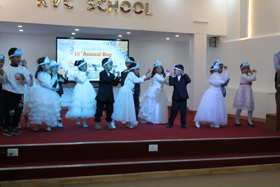 Cute preschool children performing cultural dance on school stage